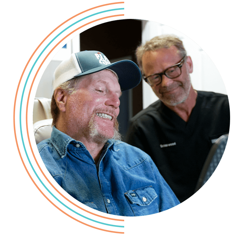 full arch patient with hat and dr norwood