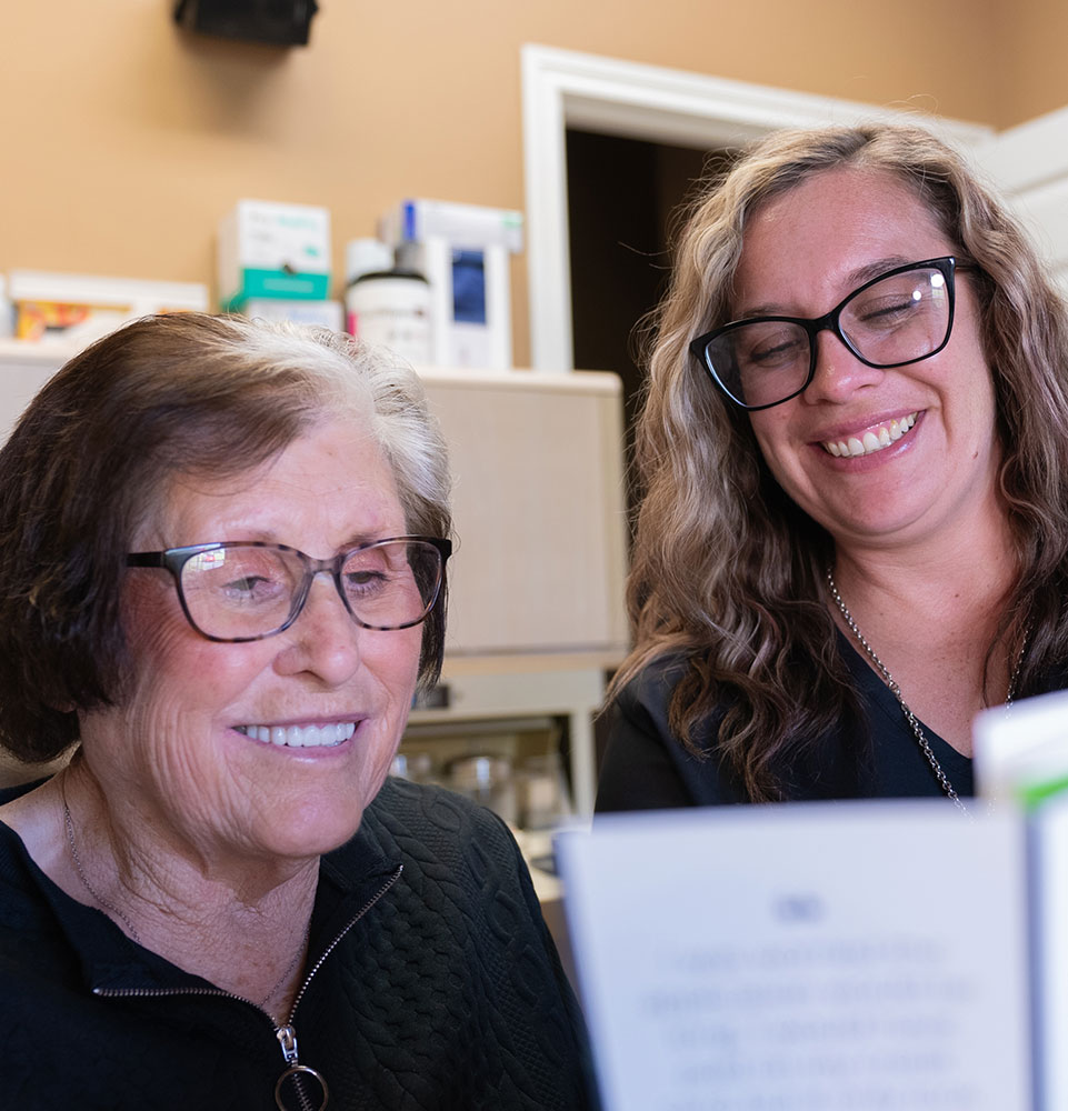 coordinator with paperwork pamphlet