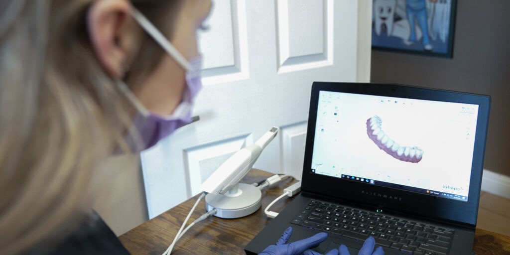 lady on computer with itero tech